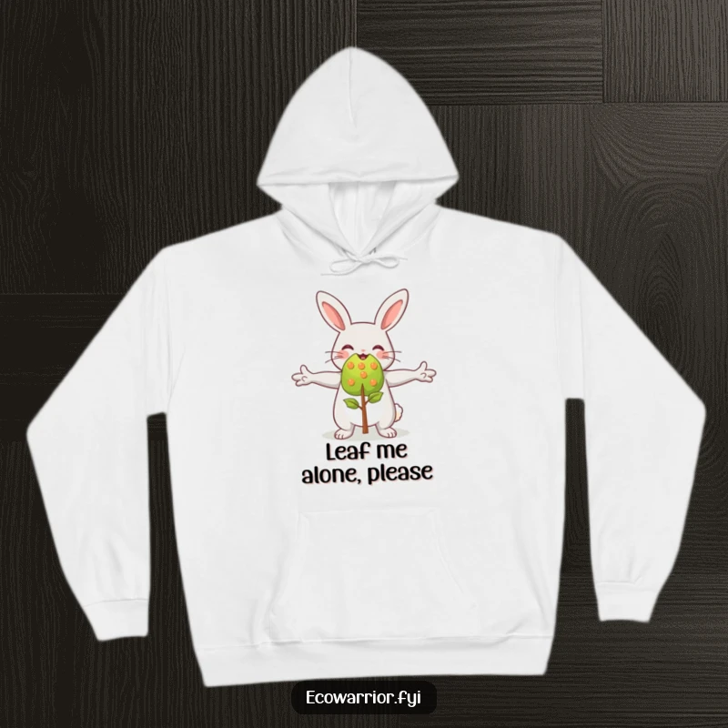 Funny, cozy hoodie featuring a happy rabbit character embracing a small sapling, radiating warmth and nature appreciation.