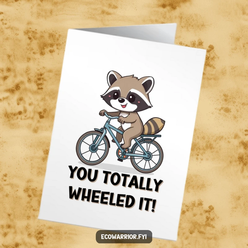 Funny Free Printable Raccoon Congratulations Card: A smiling raccoon riding a recycled bike, celebrating achievements, DIY downloadable gift.
