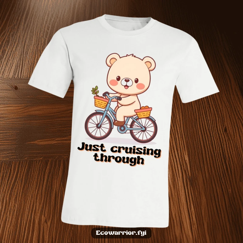 Funny Bear Cub T-Shirt depicting a cheerful character joyfully riding a bicycle with a basket, perfect for expressing happiness and fun.