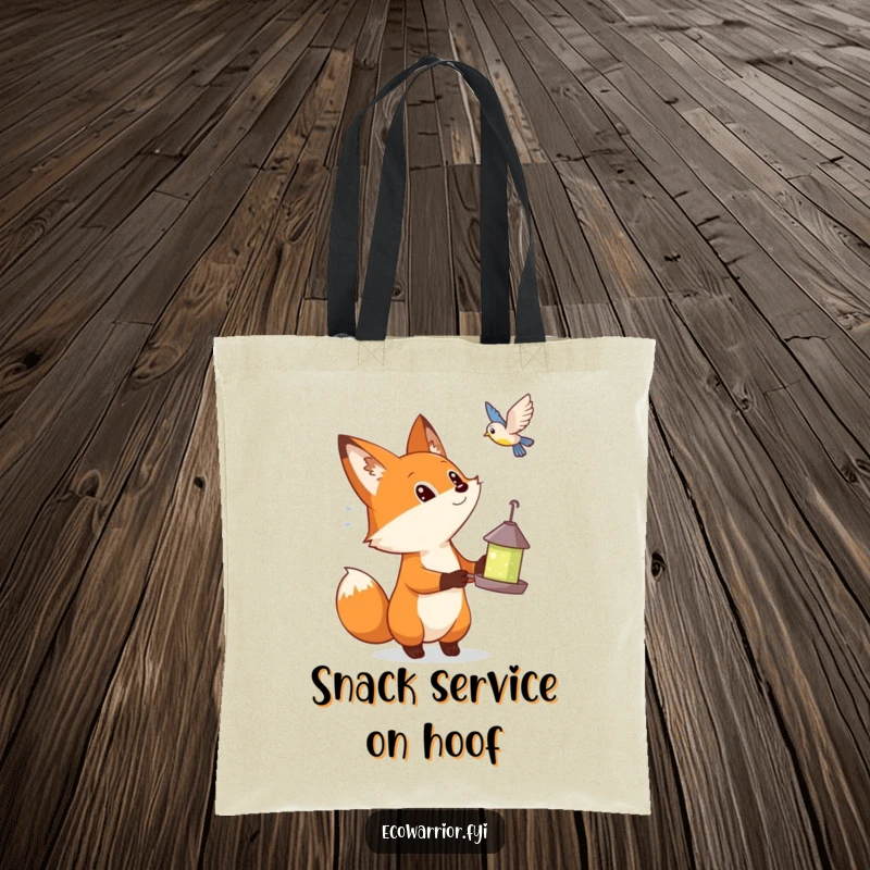 Funny tote bag showcasing a cute fox holding a bird feeder, watching a bird with pure wonder and curiosity.